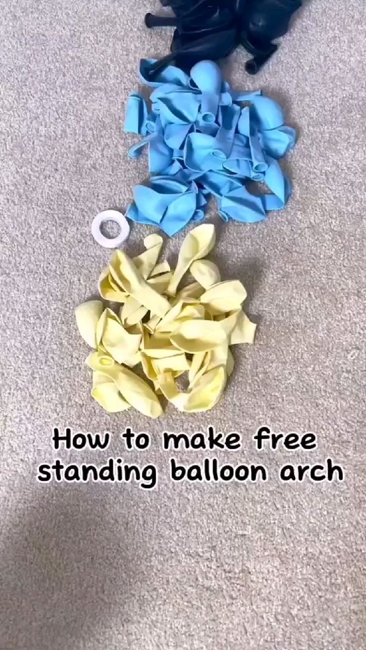 several different types of balloons on the floor with text overlay that reads how to make free standing balloon arch