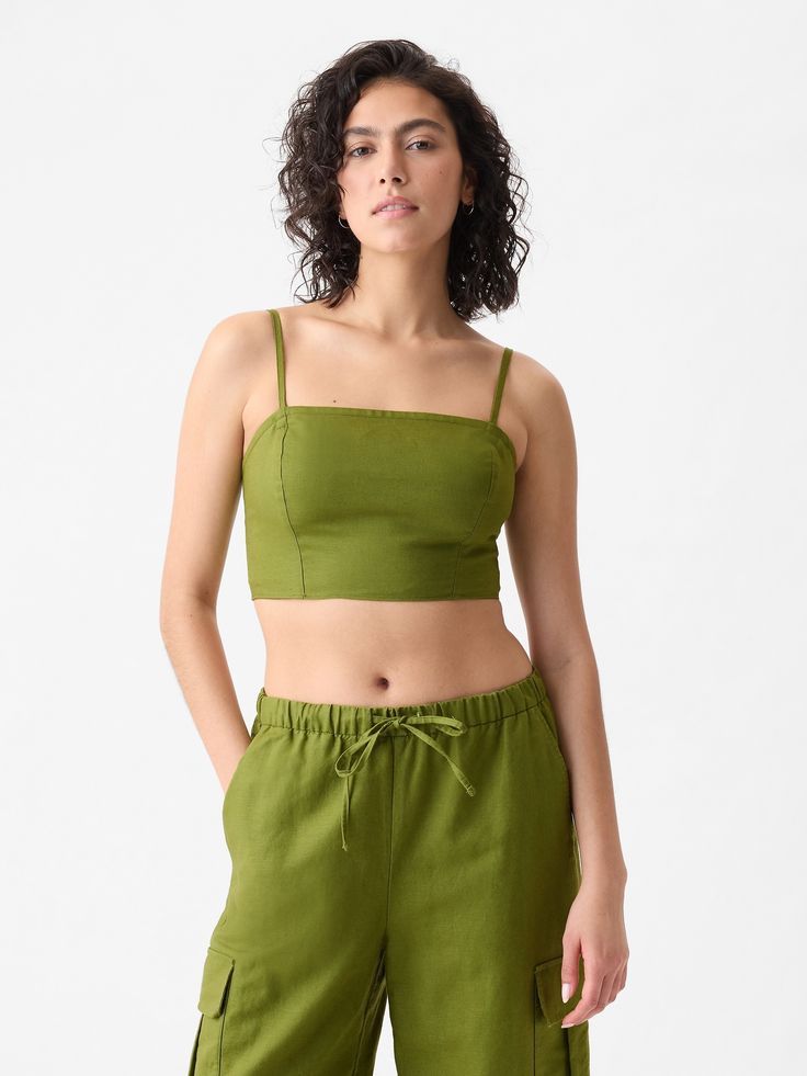 Soft linen-cotton blend ultra-cropped tube top.  Square neck.  Adjustable, removable spaghetti straps.  Smocked back.  * Fit: Slightly fitted.  Sits close to the body.  Ultra cropped, hits at the waist.  Note: Tyla is wearing a Gap Gap Cropped Tops For Spring, Casual Cropped Tube Top With Built-in Bra, Day Out Bandeau Crop Top With Built-in Bra, Gap Crop Top For Summer, Gap Cropped Top For Summer, Fitted Gap Crop Top For Spring, Gap Cropped Crop Top For Summer, Fitted Cropped Top By Gap, Casual Gap Crop Top For Spring