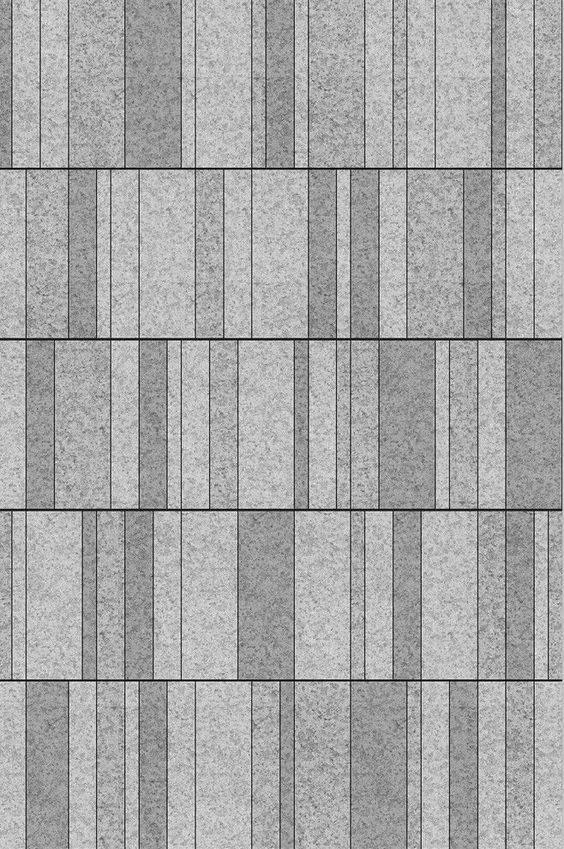 a gray brick wall textured with small squares