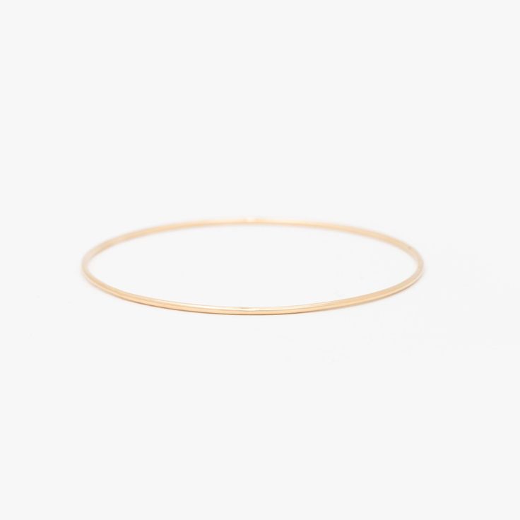 The original Yearly Co. delicate gold anniversary stacking bangle. Made of solid 14k rose gold wire, our classic bangle in 16 gauge (1.3mm) is the closest to the bangles that first began our family tradition. Adjustable Yellow Gold Bangle For Anniversary, 14k Gold Rose Gold Bangle Fine Jewelry, Rose Gold 14k Fine Jewelry Bangle, Adjustable 14k Gold Bangle, Fine Jewelry, Classic Round Band Bracelet For Anniversary, Elegant Everyday Bracelets With Round Band, Elegant Everyday Round Band Bracelets, Elegant Everyday Round Band Bracelet, Everyday Timeless Stackable Bangle