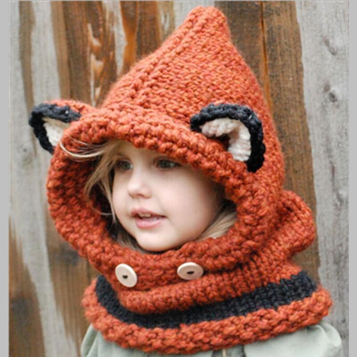 The Crochet Fox Hooded Scarf is an ideal accessory to keep your little one warm and cozy in style. This charming piece features a fox design with pointy and a button-up closure, made from soft, chunky yarn for a snug fit. The hood provides extra warmth, Ideal for colder days, this hooded scarf is must-have for outdoor adventures, whether it's a walk in the park or a fun day in the snow. Specification: Soft, Chunky Yarn: Offers warmth and comfort in chilly weather. Cozy Hood: Provides extra warmt Velvet Acorn, Fox Hoodie, Cowl Knitting, Hooded Cowl, Handmade Beanies, Pointed Ears, Fox Ears, Hat And Scarf Sets, Cowl Pattern