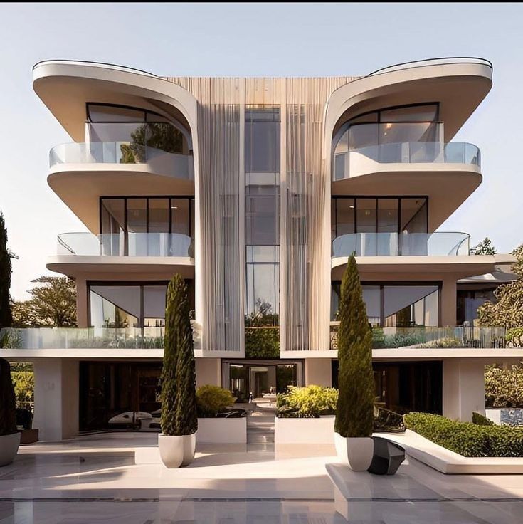 an architecturally designed building with many balconies and trees in the foreground