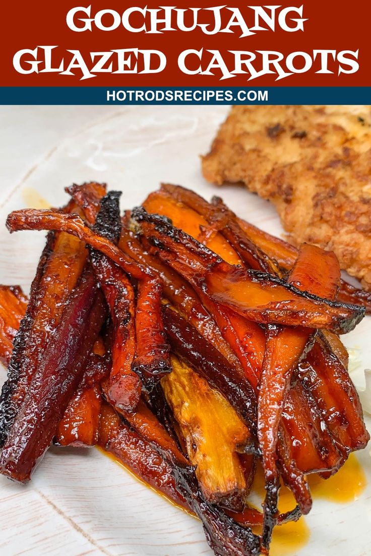 grilled carrots on a white plate with text that reads gochuang glazed carrots