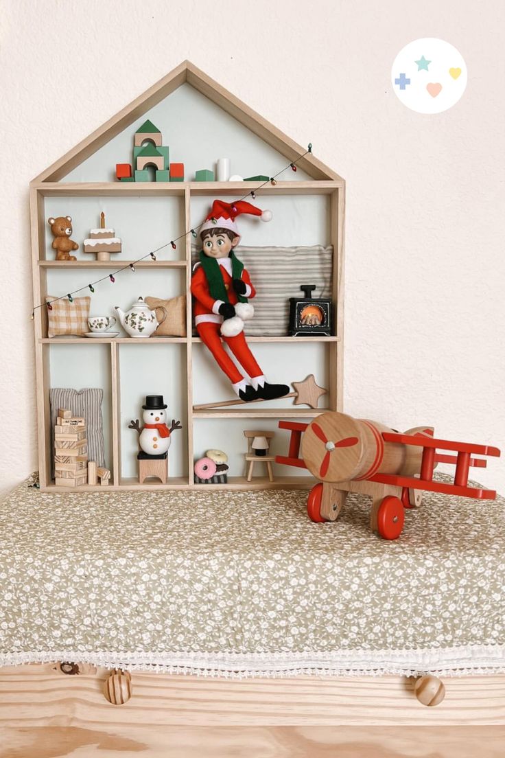 The Cutest Elf Shelf Small Christmas Decor, Mint House, Elf Shelf, Wooden Wall Shelf, Wrapping Station, Wooden Wall Shelves, Christmas Decor Inspiration, Elf House, Knick Knack