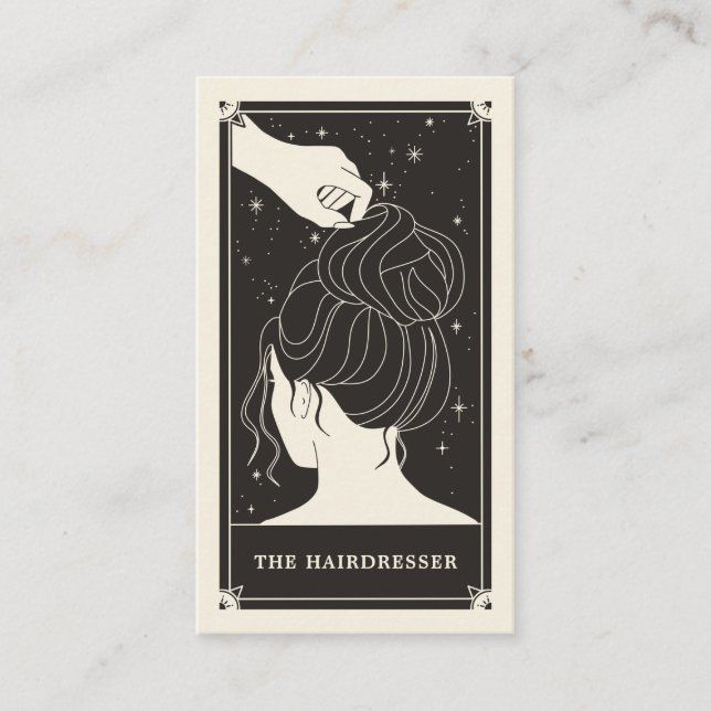 the hairdresser tarot card on a marble surface with an illustration of a woman's head