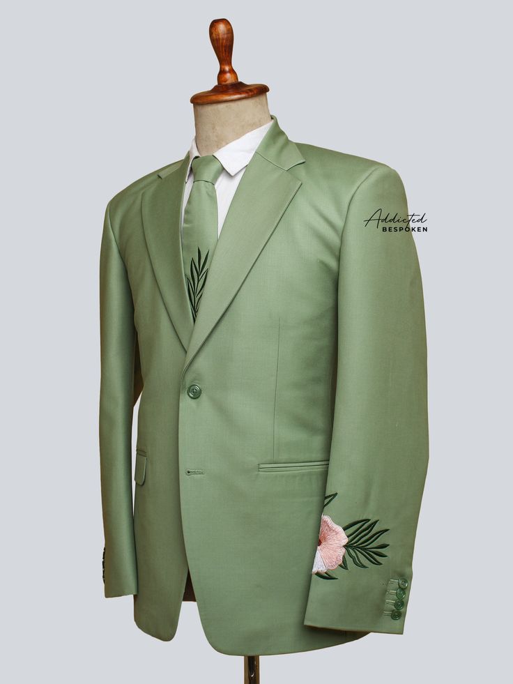 Palm Green Single Breasted Suit | Addicted Bespoken Embroidered Fitted Suit For Groom, Embroidered Fitted Suits For Groom, Elegant Blazer With Floral Embroidery For Wedding, Elegant Floral Embroidered Blazer For Wedding, Formal Tailored Blazer With Floral Embroidery, Tailored Floral Embroidered Blazer For Formal Occasions, Fitted Embroidered Suits For Ceremony, Fitted Suit With Embroidered Notch Lapel, Tailored Embroidered Suit For Formal Occasions