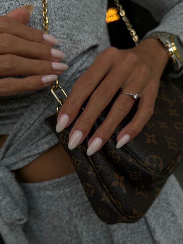 milky white, long oval nails with glittery top coat Glittery Milky White Nails, Milky Fall Nails, November Nails Oval, Milky Cream Nails, Oval White Nails, Oval Long Nails, Almond Bridal Nails, Milky Nails Ideas, White On White French Manicure