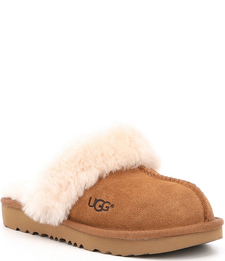 From UGG®&#x2C; the Kids' Cozy II Suede Slip-On Slippers feature:Suede upperNylon bindingFabric liningSynthetic outsoleTreadlite™ by UGG outsoleImported. Ugg Fluffy Slippers, Fluffy Ugg Slides, Ugg’s Slippers, My Christmas Wishlist Slippers, Ugg Slippers Ugg, Gray Ugg Slippers, Uggs Preppy, Tan Ugg Slippers, Trendy Ugg Slippers