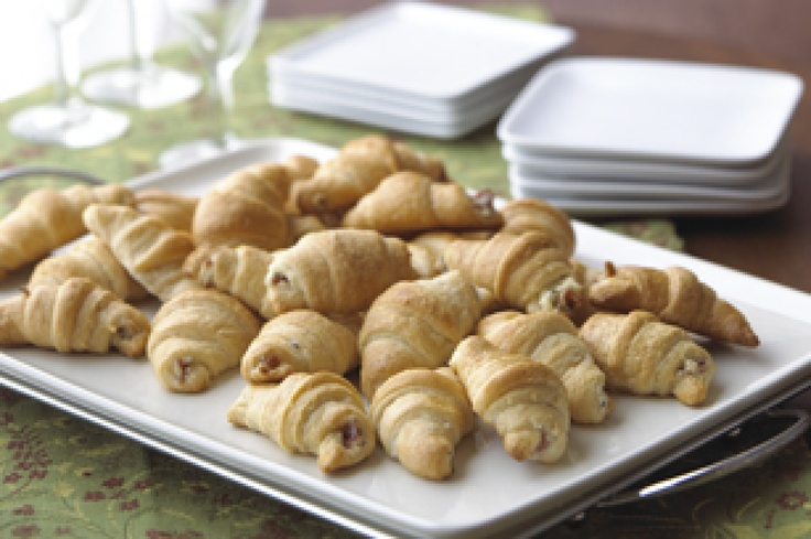 there are many croissants on the plate ready to be eaten for lunch