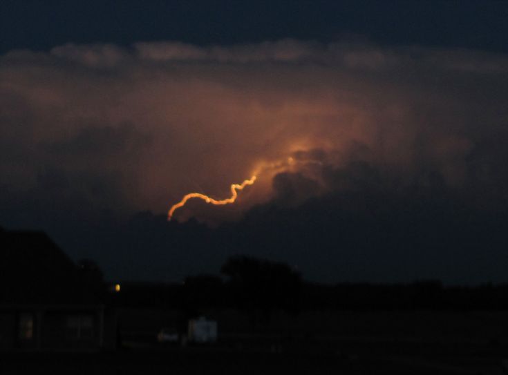 the sky is dark and cloudy at night