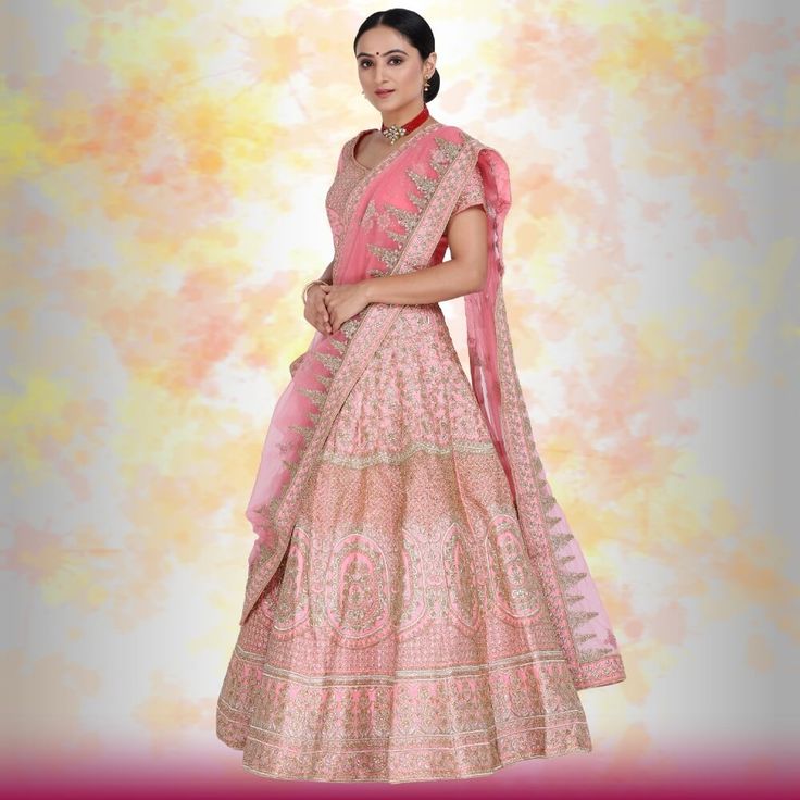 Looking for an elegant and traditional pink bridal lehenga for your wedding day? Look no further than this beautiful piece, made with luxurious silk and finished with gorgeous temple border embroidery on the dupatta and beautiful henna design embroidery on the lehenga. The entire piece is adorned with diamond work, making it truly special and perfect for your big day. You'll feel like a royal princess in this lovely lehenga! Royal Pink Lehenga, Glamorous Pink Wedding Lehenga, Pink Lehenga With Intricate Embroidery, Fusia Pink Lehenga Bridal, Pink Lehenga With Embroidered Border, Lehenga For Wedding, Pink Bridal Lehenga, Beautiful Henna, Beautiful Henna Designs