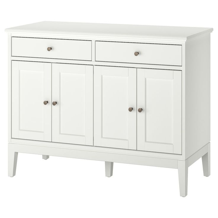 a white cabinet with three doors and two drawers