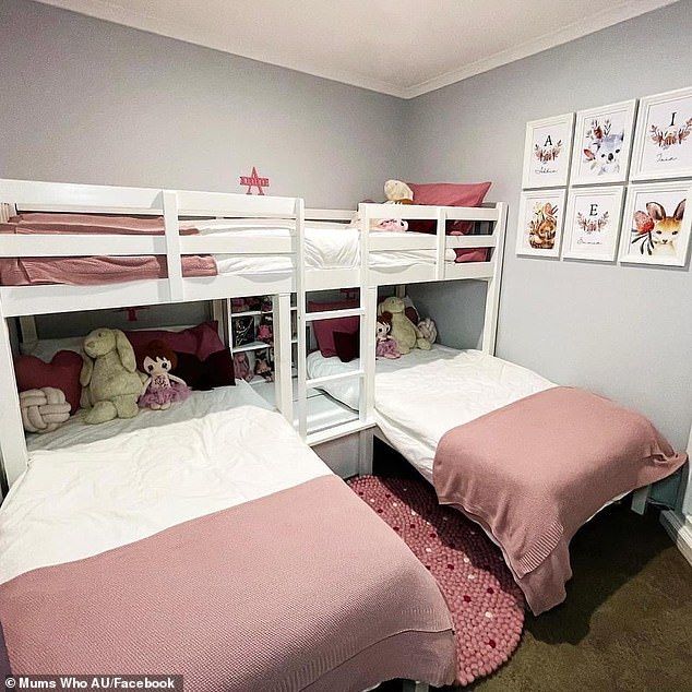 two white bunk beds sitting next to each other on top of a carpeted floor