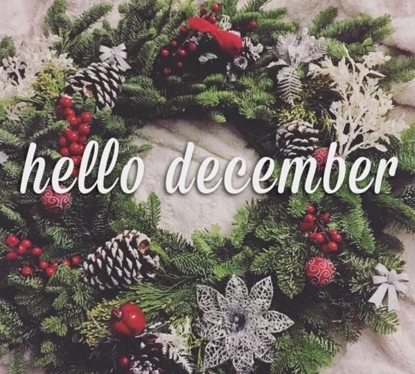 a christmas wreath with the words hello december