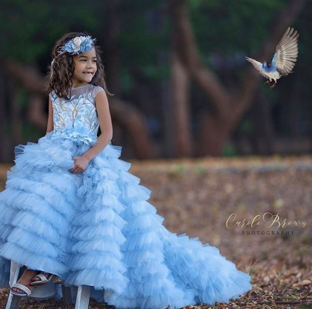 #flowergirl #peageantgirl #flowergirls #princessdress #daminha #flowergirldress #flowergirldresses #minibride #firstcommunion #firstcommuniondress #weddinggown #weddingdress #weddingday #weddingideas #weddingdecor #wedding #promdress #pageantdress #hochzeit #braut #bride #bridalgown #bridaldress #tulldress Wedding Princess Tiered Dress, Princess Style Tiered Wedding Dress, Wedding Princess Dress With Tiered Shape, Wedding Princess Dress With Tiered Style, Pageant Gown With Ruffles And Fitted Bodice, Tulle Ball Gown Dresses With Ruffles, Fitted Ruffle Fairy Dress For Dress-up, Fitted Fairy Dress With Ruffles For Dress-up, Tulle Ball Gown Corset Dress With Ruffles