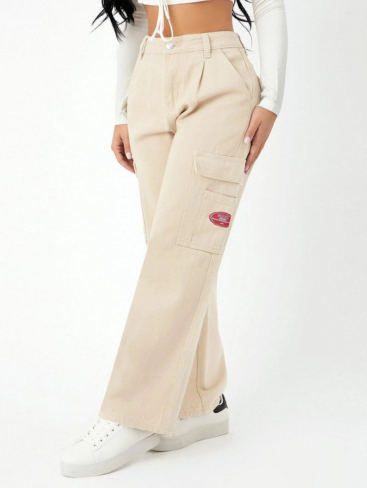 Unveil your fashion flair with our High Waist Pocket Side Wide Jeans. These cargo pants showcase a high waistline and a loose fit, creating a trendy and comfortable ensemble. The non-stretch denim fabric offers durability, while the zipper fly closure ensures easy wear. With a distinctive letter pattern and practical pockets, these tapered jeans are a versatile addition to your wardrobe. Details: Pattern Type: Letter Type: Tapered/Carrot Jeans Style: Cargo Pants Closure Type: Zipper Fly Waist Li Trendy Cotton Cargo Style Bottoms, Trendy High-waisted Relaxed Fit Cargo Jeans, Trendy Baggy Cotton Cargo Pants, Cotton Wide Leg Pants For Streetwear, Trendy Baggy Bottoms With Patch Pockets, Trendy Baggy Cargo Pants With Belt Loops, Trendy Cotton Cargo Pants With Belt Loops, Spring High Waist Urban Cargo Pants, Trendy Baggy Straight Leg Cargo Pants