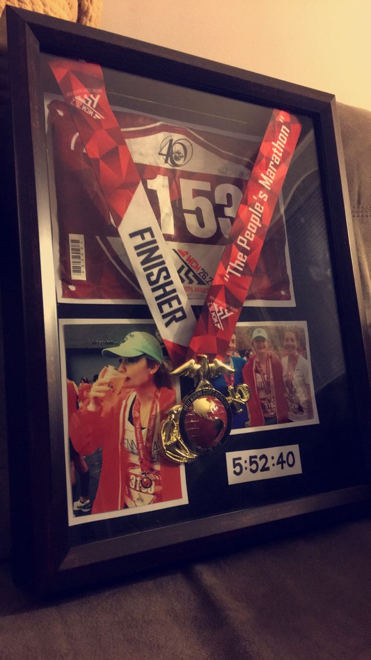 a framed photo with a medal and other sports memorabilia