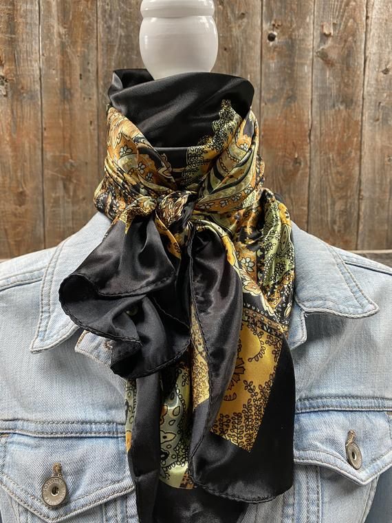 Exquisite mixtures of yellows and greens come together to form this alluring floral paisley pattern. The black background and boarder allow each and every color to stand out. Measures 35" and is a perfect square.100% machine washable polyester, silky and soft. Western Scarf, Outfit Western, Rodeo Events, Solid Black Background, Bright Pop, Golden Rod, Wild Rag, Perfect Squares, Yellow Outfit