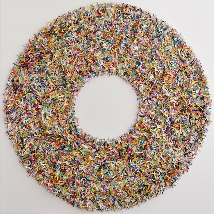 a circular object made out of small sprinkles