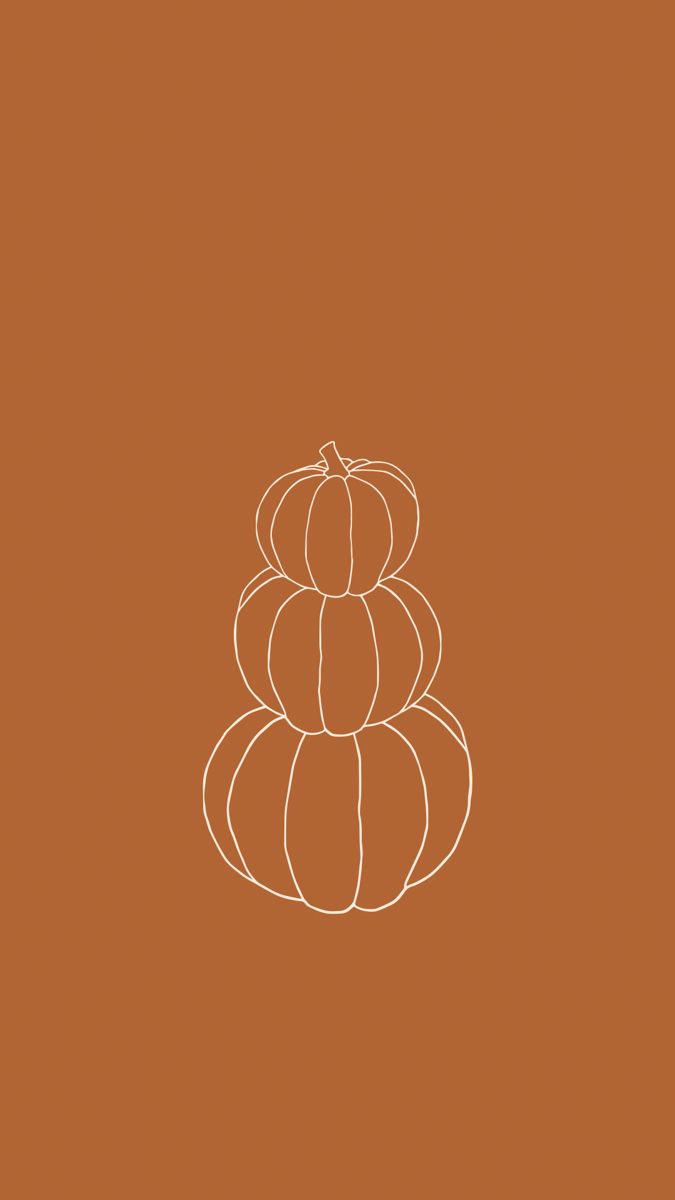 three pumpkins stacked on top of each other in the middle of a brown background