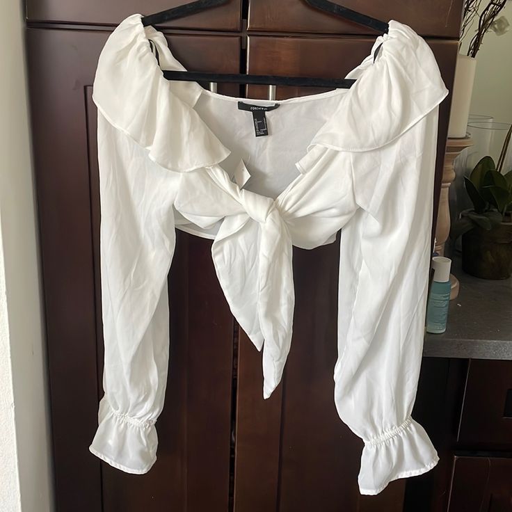 Super Cute Off She Shoulder Frill Ruffle Senorita Mexican Style Shirt Bardot Style Crop Top Tie Front. Dress Up Or Down With A Skirt, Cutoff Shorts, Heels, Flats, Etc. Bundle For Additional Discounts. Cream White Color. New With Tags. White Summer Tops For Date Night, White Tops For Summer Date Night, White Top For Summer Date Night, White Tops For Date Night In Summer, White Long Sleeve Top For Date Night, Forever 21 Long Sleeve Summer Crop Top, Forever 21 Long Sleeve Crop Top For Summer, Forever 21 White Crop Top For Brunch, Forever 21 White Blouse For Spring