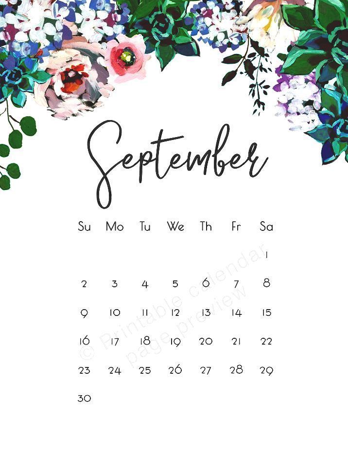 a calendar with flowers and leaves on it