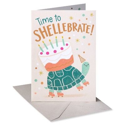 a birthday card with an image of a turtle holding a cake on it's back