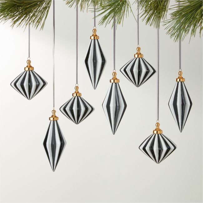 black and white ornaments hanging from a christmas tree