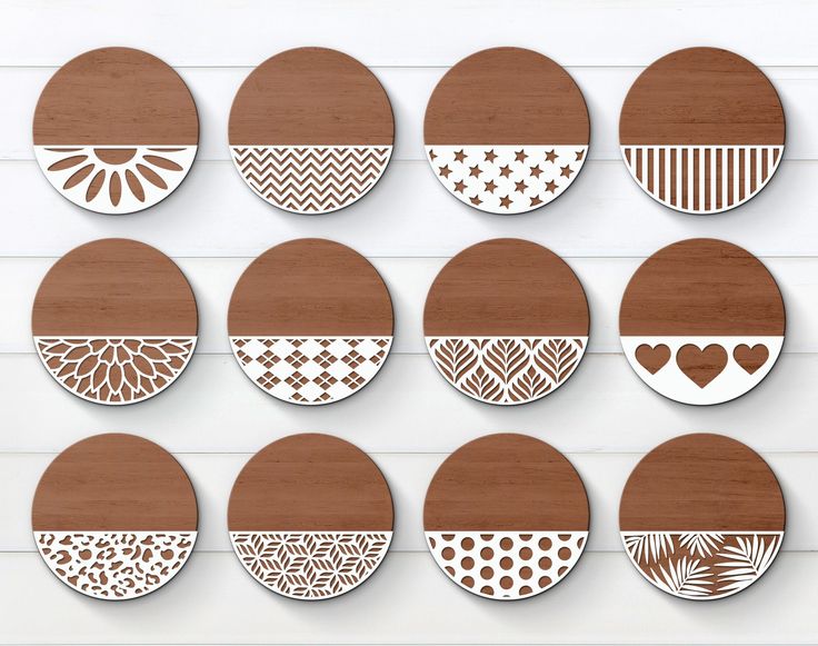 twelve wooden circles with intricate designs on them