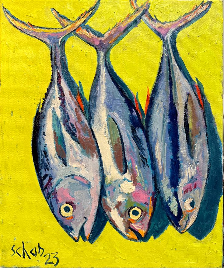 three fish are shown on a yellow background