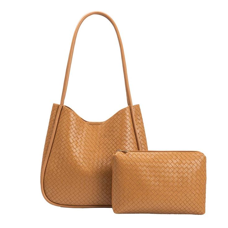 The Mischa by Melie Bianco is a double-handle tote bag made from recycled vegan leather and non-toxic hardware. The front and back feature an embossed woven print. Includes a removable zip pouch to keep your most important belongings secure. Recycled Vegan Leather 11"W x 10"H x 2.5" D Handle Drop: 12" Magnetic Closure Gold-Hardware Interior Zip Pocket Exterior Slip Pocket Removable Zip Pouch Unlined Fits up to a standard-size tablet Woven Leather Hobo Tote Bag For On-the-go, Daily Use Woven Leather Hobo Shoulder Bag, Everyday Use Hobo Shoulder Bag With Braided Handles, On-the-go Woven Leather Hobo Tote Bag, On-the-go Woven Leather Pouch Shoulder Bag, Daily Use Woven Leather Bucket Shoulder Bag, Everyday Woven Leather Hobo Shoulder Bag, Woven Leather Shoulder Bag For On-the-go, Woven Leather Hobo Shoulder Bag