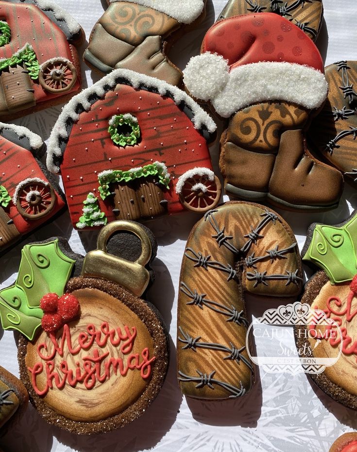 christmas cookies decorated like santa's hats and boots