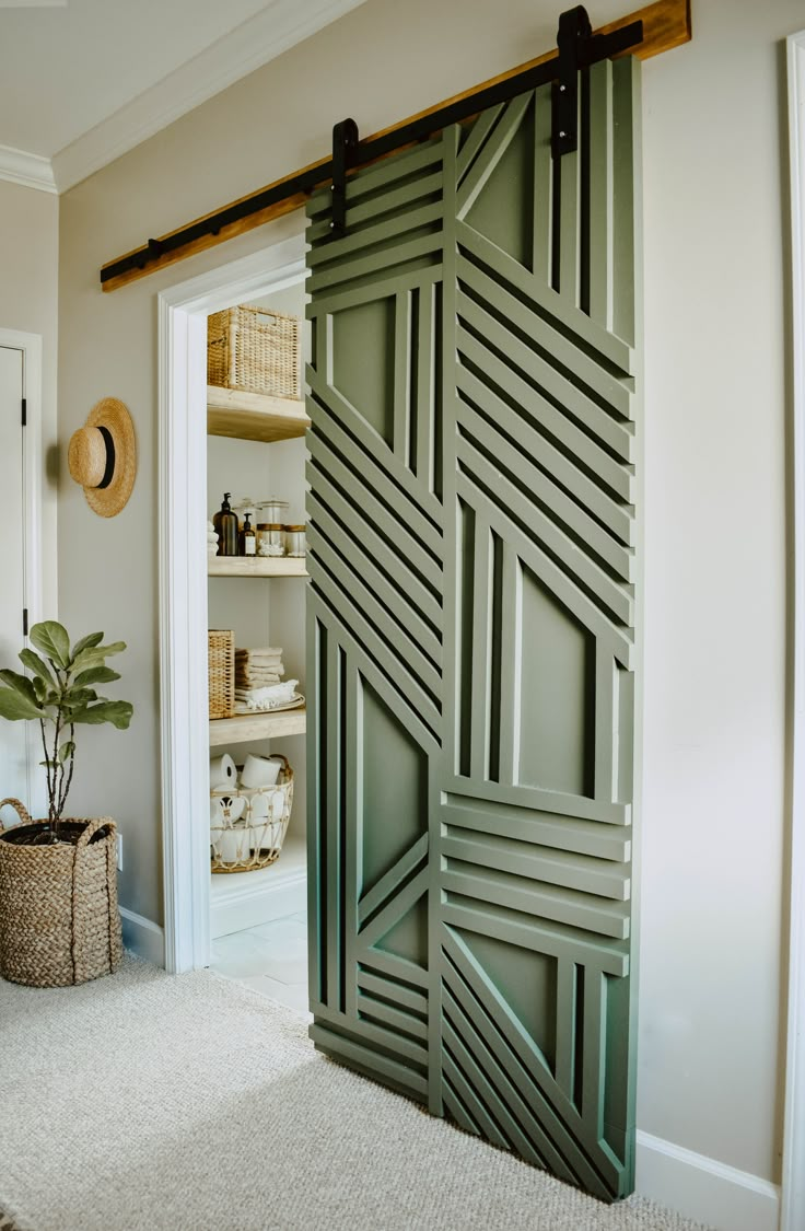 an open door in a room with shelves and baskets