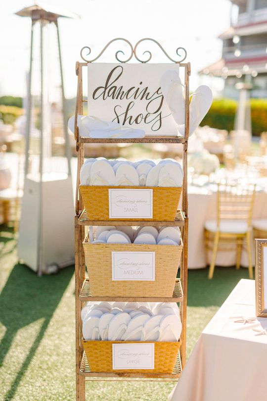 a display case filled with lots of white plates