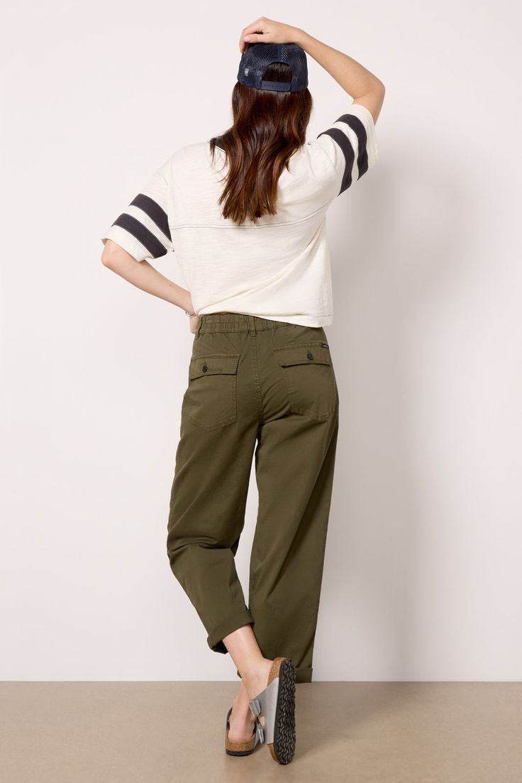 Utility-style pockets detail the Cruiser Chino pants by Sanctuary, featuring a slight barrel leg shape with rolled hems. Dress them up with a blouse and mules, or keep them casual with a tee and slides. | SANCTUARY Women's Cruiser Chino Pants, Size 24, Green Versatile Bottoms For Casual Gatherings In Fall, Versatile Fall Bottoms For Casual Gatherings, Casual Khaki High-waisted Chinos, Fall Bottoms With Welt Pockets For Everyday, Everyday Bottoms With Welt Pockets For Fall, Spring Casual Chinos For Work, Casual Tapered Leg Chinos For Fall, Spring Casual Workwear Chinos, Casual High-waisted Khaki Chinos