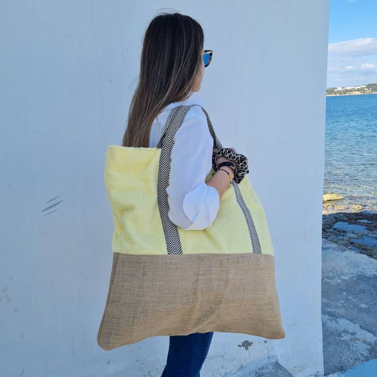 Terry Beach Bag: This is an oversize beach bag made of 100% cotton and fully lined with floral fabric. It has a towel pocket inside and it can be flat packed.  An ideal seaside accessory, the large  beach bag is equally at home on the beach or by the pool. Featuring  sturdy handles, this towel fabric bag can be carried by hand or over the shoulder to hold your towels and a change of clothes. Colors: Off White, Pink,  Yellow, Leopard Dimensions: 60cm x 50cm Material: Cotton Towel Fabric, Burlap T Oversized Beach Bags, Natural Leather Sandals, Towel Bag, Summer Handbag, Large Beach Bags, Summer Handbags, Handmade Sandals, Handbag For Women, Bag Summer