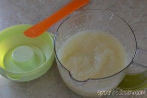 there are two measuring cups next to each other with liquid in them on the table