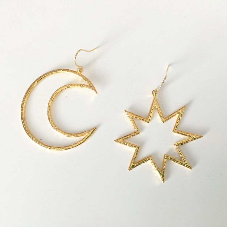 asymmetrical moon and star earrings gold plated over brass Adjustable Celestial Star Jewelry, Elegant Metal Earrings With Star Charm, Star Shaped Metal Jewelry With Star Charm, Metal Star Charm Jewelry, Celestial Style Yellow Gold Plated Hoop Earrings, Elegant Star-shaped Pierced Jewelry, Celestial Style Gold-plated Yellow Gold Hoop Earrings, Elegant 14k Gold Filled Star Jewelry, Elegant Star-shaped 14k Gold Filled Jewelry