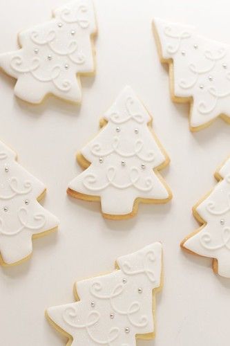 decorated cookies in the shape of christmas trees