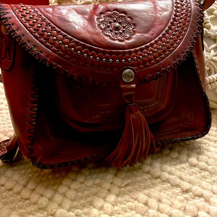 Crossbody Stylish Designer Bag, In Mint Condition. Amazing Value For The Like New Condition, Just Upcycling Items I Haven’t Worn In Awhile . Inside Clean With No Signs Of Wear, Like New Condition Overall. Luxury Red Leather Saddle Bag, Designer Burgundy Bags With Leather Lining, Elegant Red Leather Saddle Bag, Vintage Red Shoulder Bag With Leather Lining, Red Vintage Shoulder Bag With Leather Lining, Bohemian Crossbody Bag With Leather Lining, Vintage Handmade Red Satchel, Vintage Red Handmade Satchel, Handmade Vintage Red Satchel