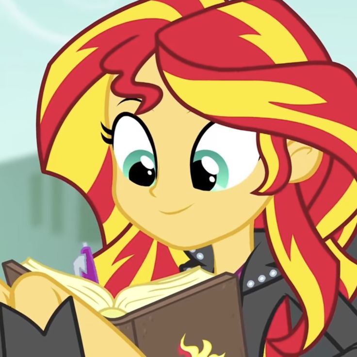 a girl with red hair is reading a book