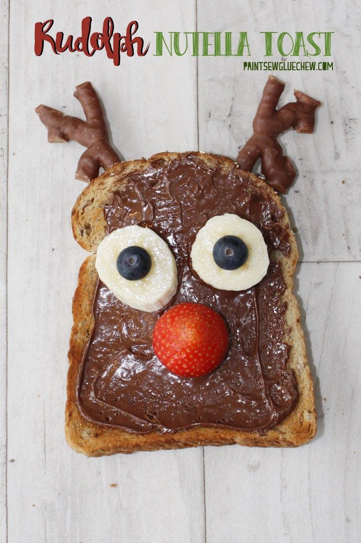 a piece of bread with chocolate frosting on it and a face made to look like a reindeer