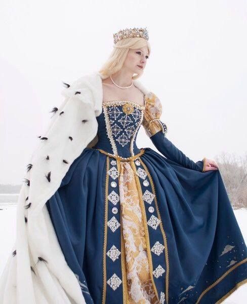 https://www.facebook.com/TheOldAndWhimsicalWorld/photos/ms.c.eJwzN7Q0NDQztzQ0NTIyNDbWM4fwjSwMLSwsDMygfAsTEN~ Midevil Queen Costume, Gold And Blue Gown, Reinassance Outfits Women, Royal Queen Costume, Queen Outfits Royal Dress, Fantasy Royal Clothing Queens, Royal Winter Dress, Winter Queen Dress, Winter Medieval Dress