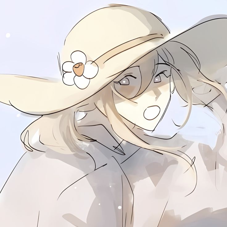 a woman wearing a white hat with a flower on it's brim and her hair blowing in the wind