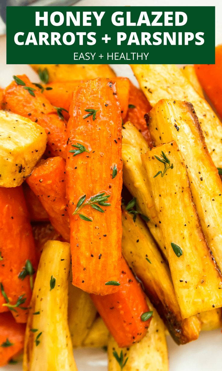 roasted carrots and parsley on a white plate with the title honey glazed carrots and parsley