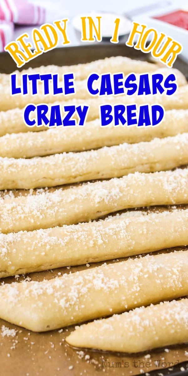 some bread sticks sitting on top of a baking pan with the words ready in four little caesars crazy bread