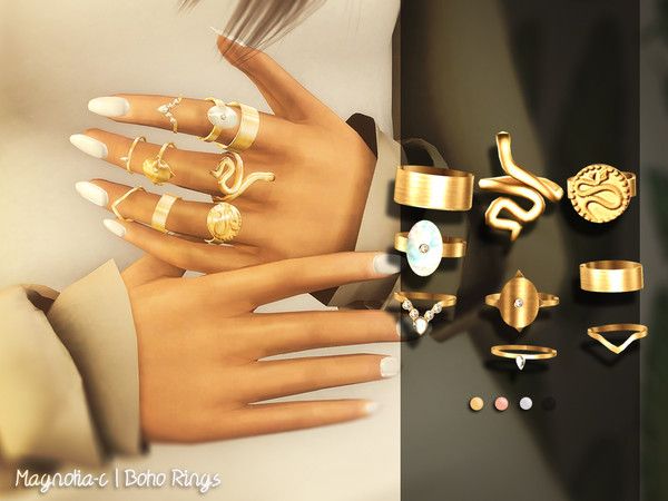 a woman's hand with many rings on it and other jewelry items in front of her