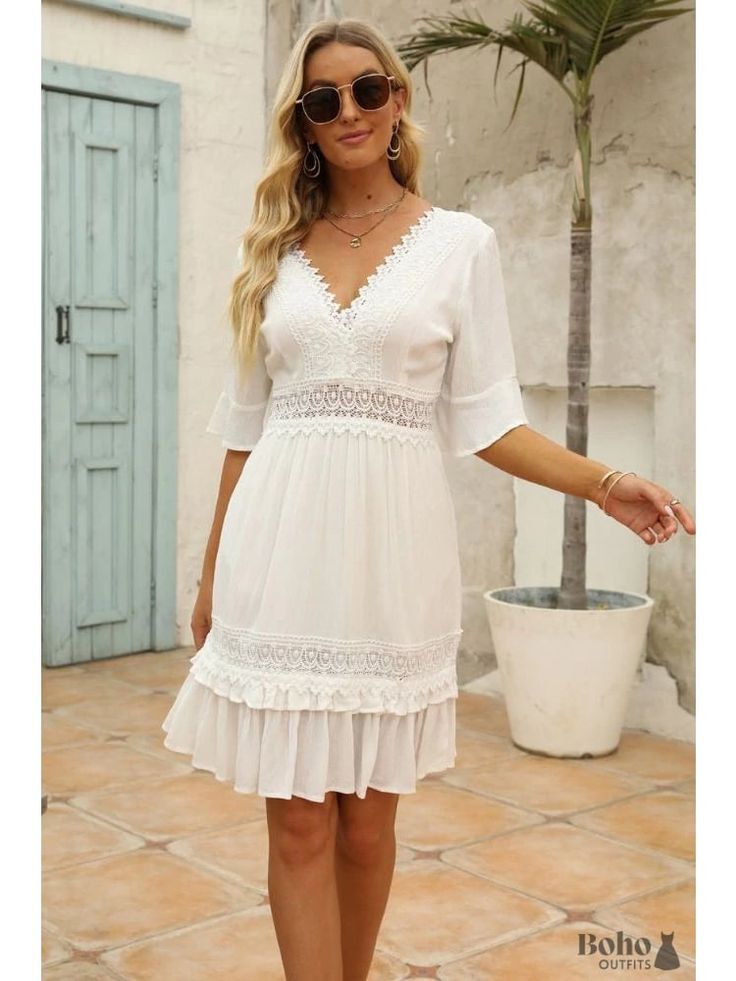 Boho White Mini Dress Teresa - S - Dresses Bohemian V-neck Dress With Crochet Trim, Flowy V-neck Boho Dress With Lace Trim, V-neck Lace Patchwork Dresses For Vacation, V-neck Dress With Lace Trim For Vacation, Summer Mini Dress With Lace Trim And V-neck, White V-neck Lace Dress With Lace Trim, Feminine White V-neck Dress For Beach, Feminine White V-neck Dress For Vacation, Feminine V-neck Dress With Crochet Trim