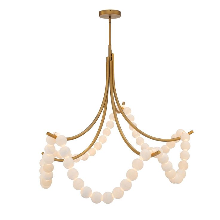 a chandelier with white beads hanging from the ceiling