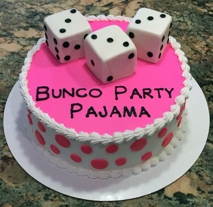 a birthday cake decorated with dice and the words bunco party pajama